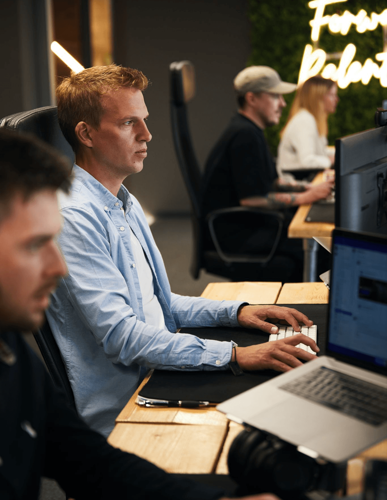 Image of a man looking at a computer